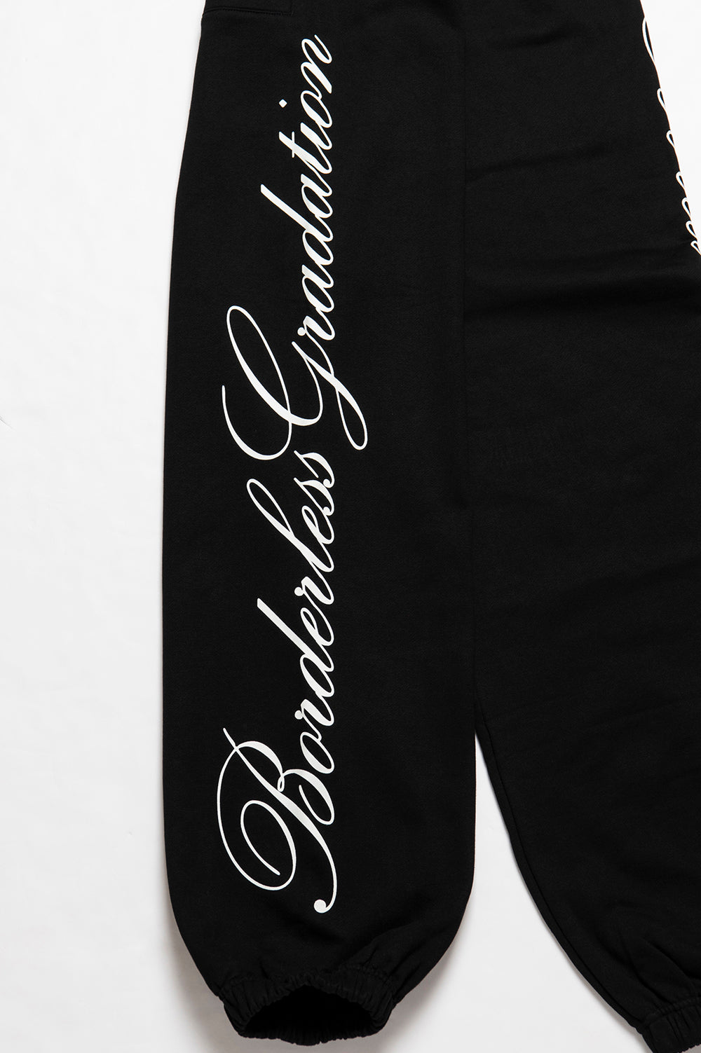 CURSIVE LOGO PANTS
